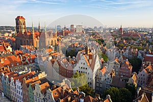 Gdansk is a city in Poland. Gdansk in the morning rays, the sun is reflected from the roofs of the old city.