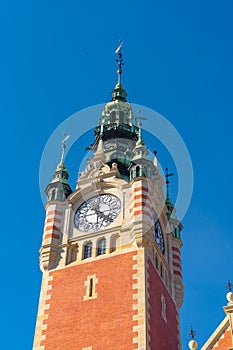 Gdansk Glowny is the historic exterior of main railway station with clock tower, Poland