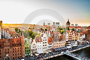 Gdansk, North Poland - Panoramic aerial shot of Motlawa river embankment in Old Town during sunset in summer