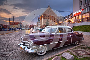 Gdansk, Poland - April 16, 2019: Classic Cadillac car parked at the old town of Gdanks, Poland