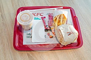 Grander Burger meal with drink and french fries at KFC Kentucky Fried Chicken restaurant.