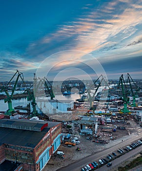 Gdansk, Poland - December 20, 2023: Shipyard areas in Gdansk at sunrise. Poland