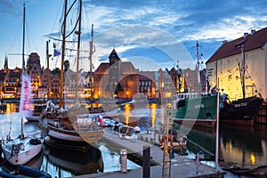 Gdansk, Poland - July 8, 2019: Beautiful scenery of Gdansk over Motlawa river at dusk, Poland. Gdansk is the historical capital of