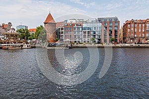 Gdansk, Poland - Juny, 2019. Gdansk old town and famous crane, Polish Zuraw. View from Motlawa river. The city also known as