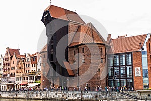 Gdansk, Poland - Juny, 2019. Gdansk old town and famous crane, Polish Zuraw. View from Motlawa river. The city also known as