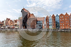 Gdansk, Poland - Juny, 2019. Gdansk old town and famous crane, Polish Zuraw. View from Motlawa river. The city also known as