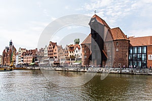 Gdansk, Poland - Juny, 2019. Gdansk old town and famous crane, Polish Zuraw. View from Motlawa river. The city also known as