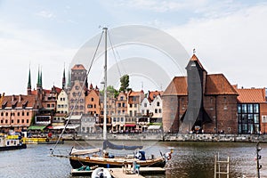 Gdansk, Poland - Juny, 2019. Gdansk old town and famous crane, Polish Zuraw. View from Motlawa river. The city also known as