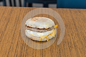 Mcdonalds McMuffin with pork and egg. McMuffin is breakfast sandwich in McDonald photo
