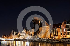 GdaÅ„sk Old Town - the Historical Port Crane Gate and Houses on the MotÅ‚awa River in the Evening Time