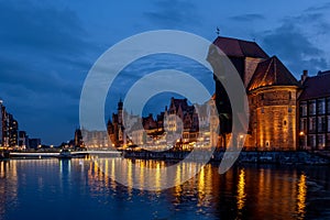 GdaÅ„sk Old Town and the old crane over the MotÅ‚awa River in the evening