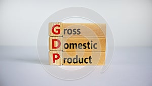 GDP, gross domestic product symbol. Concept word `GDP, gross domestic product` on cubes on a beautiful white background. Busines