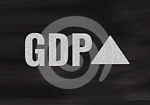 GDP growth arrow up on a black chalkboard