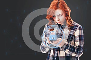 GDPR concept image. General Data Protection Regulation, the protection of personal data. Young woman with smartphone.