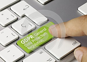 GDPR General Data Projection Regulation - Inscription on Green Keyboard Key