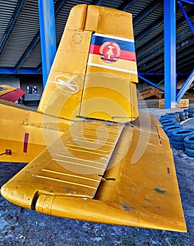 GDR flag on a agricultural airplane in yellow