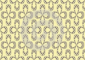 Geametric creative seamless pattern. Four leaves flower shape with dots in grey color. Light yellow background is easy