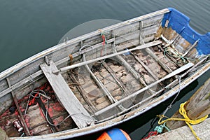 The gear is in the boat which is ready to shove off.