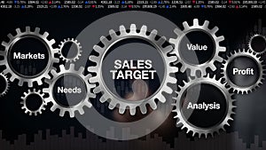 Gear with keyword, Markets, Needs, Profit, Analysis, Value. Businessman touch screen 'SALES TARGET'