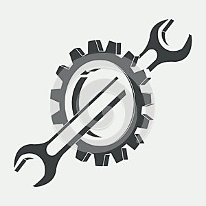 Gear and spanner vector icon. Black and white illustration in flat style