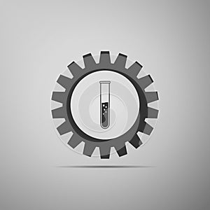 Gear and test tube icon isolated on grey background. Chemical industry concept. Cogwheel and flask sign. Experiment