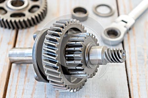 Gear wheels on a wooden table