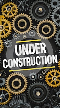 Gears background adorned with striking under construction text for emphasis photo