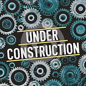 Gears background adorned with striking under construction text for emphasis photo