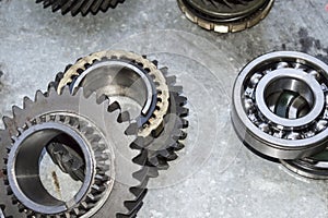 The gears and bearings of the mechanical transmission are on the desktop