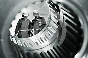 Gears, bearings, technology and workers photo