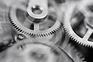 Gears black-and-white. Industrial background. The concept of technology, time, teamwork, infinity, business projects