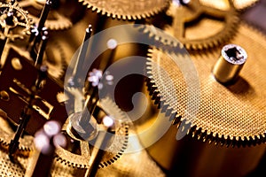 Gears and clockwork components details, concept Time and Horology photo