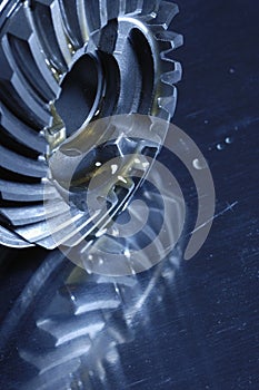 Gears, cogs, titanium and oil, lubricants photo
