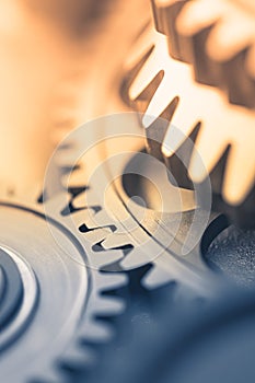 Gears industrial background with warm shiny light