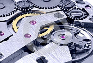 Gears of a mechanical watch with blue toning