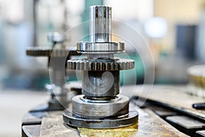 Gears for transmission of speeds and revolutions with bearings of a cnc machine tool. Mixed equipment repair photo
