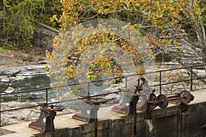 Gears and wheels of old dam machinery in Collinsville, Connecticut.