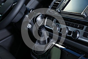 Gearshift and dashboard inside of car