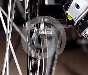 Gearshift on mountain bike MTB, chain moves on rings. Changes speeds. Shift gears on bicycle crank. Work of chain drive chainset.