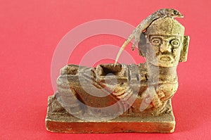 Gecko Lizard and Mayan Statue