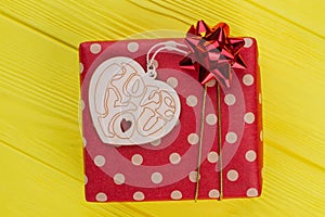 Ged dotted gift box and heart shaped wood.