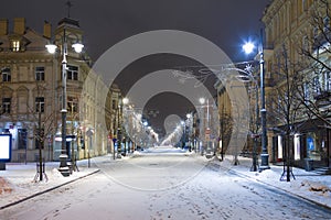 Gediminas street in Vilnius at Christmas time with white snow