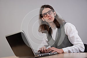 Geek guy is learning new technologies, programming, and computer modeling.