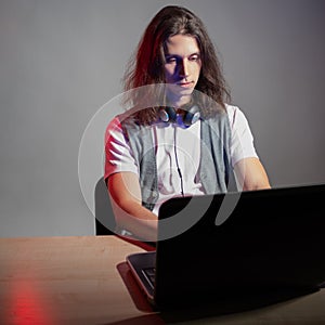 Geek guy is learning new technologies, programming, and computer modeling.