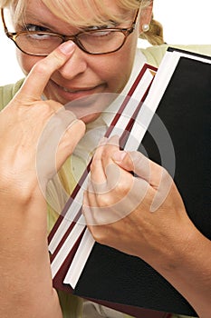 Geek Student with Braces Carries Books