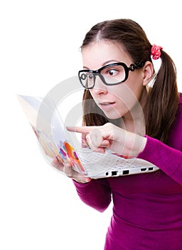 Geeky woman with a laptop photo