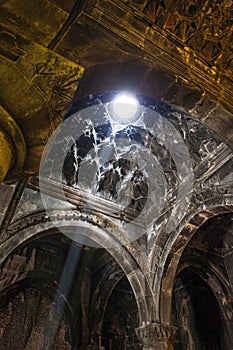 Geghard, a monastery complex, a unique architectural structure in Armenia, with beautiful and carved columns and arches inside the