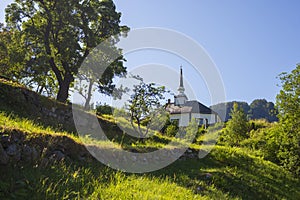 Geiranger Church, which dates back to 1589, photographed during a clear summer day