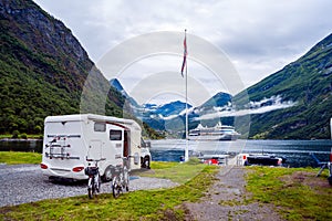 Geiranger fjord, Norway. Family vacation travel RV, holiday trip in motorhome, Caravan car Vacation