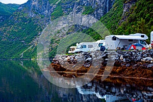 Geiranger fjord, Norway. Family vacation travel RV, holiday trip in motorhome, Caravan car Vacation